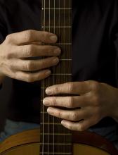 Hands on Guitar | Photograph by Raphael Shevelev